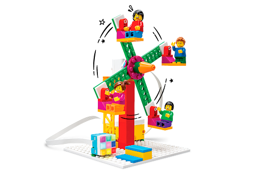 Students programming a LEGO® SPIKE™ creation.